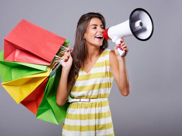 Close up of woman shouting via the loudspeaker