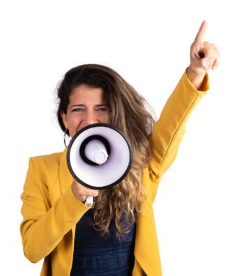 Portrait of young beautiful woman screaming on a megaphone isolated on white background. Marketing or sales concept.